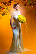 Photo: Gorgeous young redhead woman with bouquet of flowers Gorgeous young redhead woman with bouquet of flowers