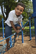 Young boy playing at a park Young boy playing at a park