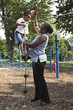 Mother and son playing at a park Mother and son playing at a park
