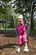 Mother and daughter playing at a park Mother and daughter playing at a park