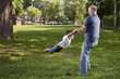 Father and son spinnig at the park Father and son spinnig at the park