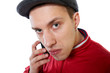 Portrait of a young mobster in red jacket with phone, closeup Portrait of a young mobster in red jacket with phone, closeup