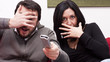 Funny Adult Couple Watching Television at Home
