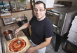 Chef making a pizza