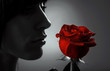 Woman with red rose, macro, black white and red rose Woman with red rose, macro, black white and red rose