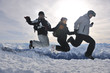 Foto: people group on snow at winter season people group on snow at winter season