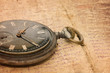 watch on an old notebook with the text