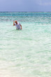 Senior Citizen Snorkeling in Tropical Waters