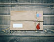 Old envelope on wooden table