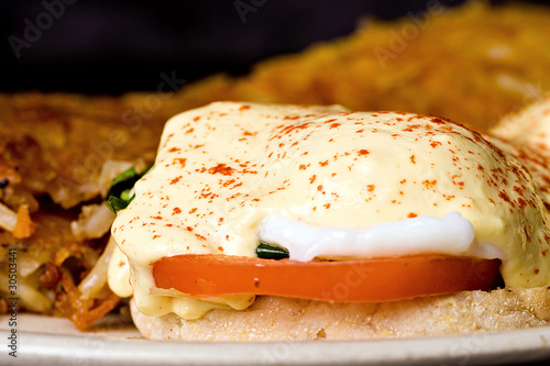 Photo: Eggs Benadict and Hash Browns for Breakfast Eggs Benadict and Hash Browns for Breakfast