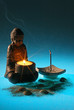 Bouddha, bougie et encens ambiance bleue
