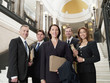 Smiling lawyers in lobby