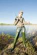 woman fishing at a pond