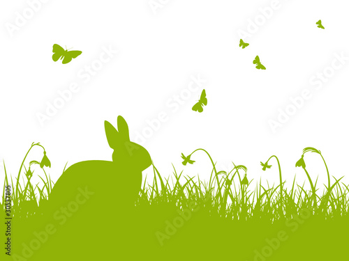 Vektor: Grüne Silhouette - Hase auf einer Wiese mit Schmetterlingen Grüne Silhouette - Hase auf einer Wiese mit Schmetterlingen