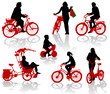 Silhouettes of people and children on bicycles