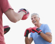 Laughing boxer training with sparring partner