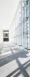 Glass corridor walls in modern office building