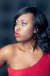 Beautiful young black woman, isolated on black