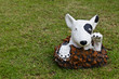 statue of a dog decorated on the lawn statue of a dog decorated on the lawn