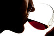 Silhouette of man tasting alcohol Silhouette of man tasting alcohol