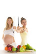 happy woman with fruit, blender and a knife