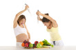 Two women are preparing to attack the fruit
