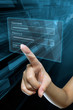 a woman hand sign in  her login and password on a screen