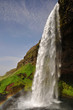 Seljalandsfoss waterfall with rainbow, south Iceland