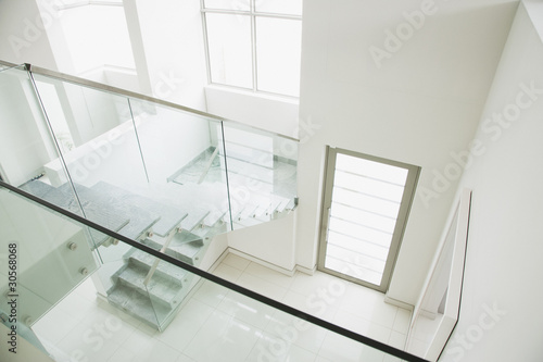Photo: Glass railing on staircase in modern house Glass railing on staircase in modern house