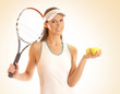 A young and sporty woman with tennis equipment A young and sporty woman with tennis equipment