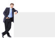 Portrait of a handsome young man in a business suit