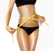 beautiful woman measuring perfect shape