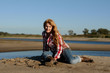 The red girl on a beach