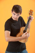 Serious Teen ukulele player Serious Teen ukulele player