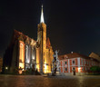 Church and monument at night