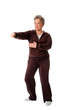 Photo: Senior woman doing Tai Chi Yoga exercise Senior woman doing Tai Chi Yoga exercise