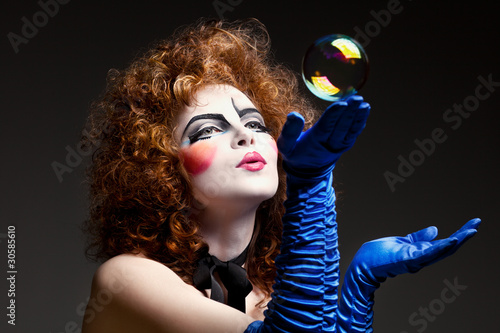 Photo: woman mime with soap bubbles. woman mime with soap bubbles.