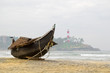Traditional wooden fishing boat on Kovalam beach, Kerala, India