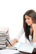 Business woman writing and talking on phone