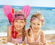 Children Playing On  Beach.