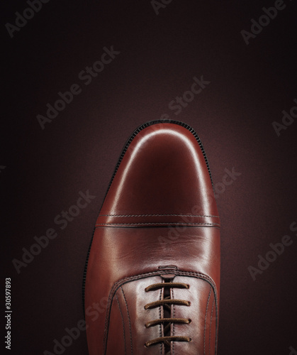 Photo: Close up of man?s shoe Close up of man?s shoe