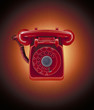 "Close up of red, old-fashioned telephone"