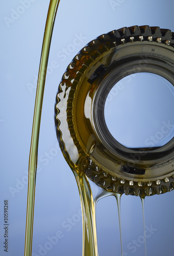 Photo: Motor oil dripping from tire Motor oil dripping from tire