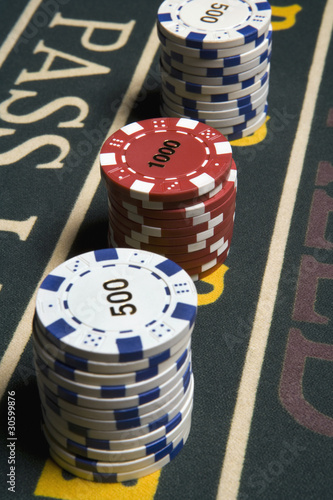 Foto: Close up of stacks of gambling chips Close up of stacks of gambling chips