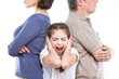 Close up of a frightened girl between her parents