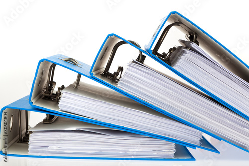 Foto: Akten Ordner mit Schriftstücken und Dokumenten Akten Ordner mit Schriftstücken und Dokumenten