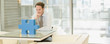 Businessman looking at jigsaw puzzle piece