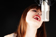 young artist woman recording in a studio young artist woman recording in a studio