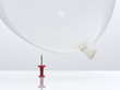 Balloon about to fall on pushpin