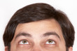 Young man looking up